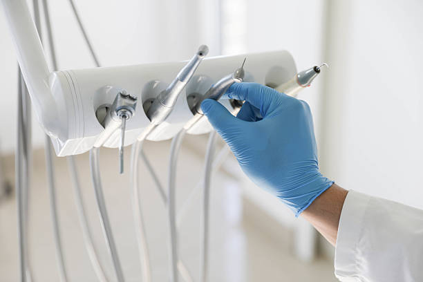 Professional Teeth Whitening technician working in Pine Manor, FL